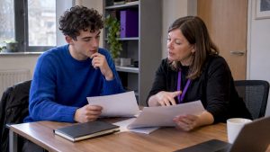 Prospective teacher discussing TEFL training options