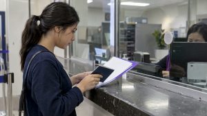 Applicant reviewing passport and visa documents